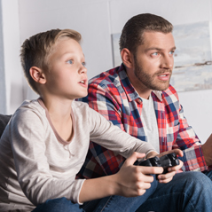 ather and son playing video games