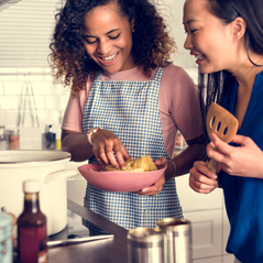 two women cooking